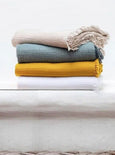COCOON REVERSIBLE THROW & BLANKET CURRY MARIGOLD